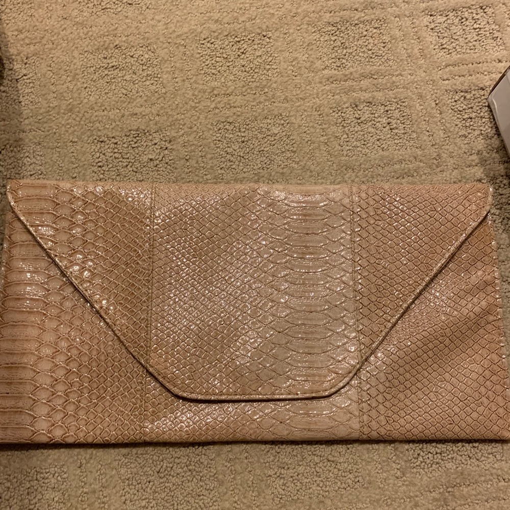 Faux snake skin large clutch. Cream colored.